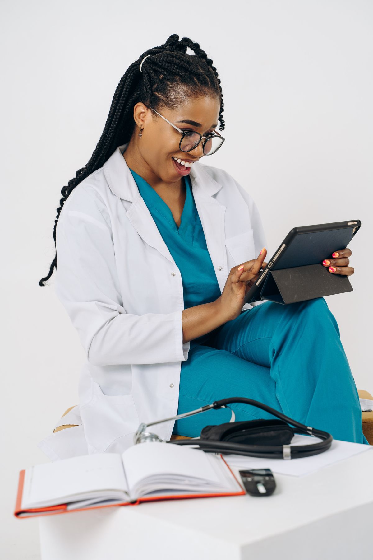 Clinician using a tablet in a modern clinic